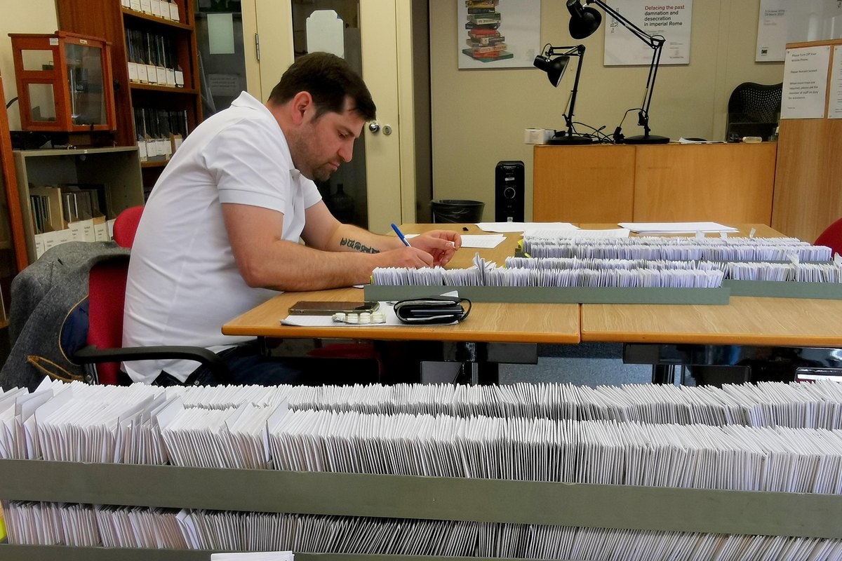 Coins being catalogued and valued